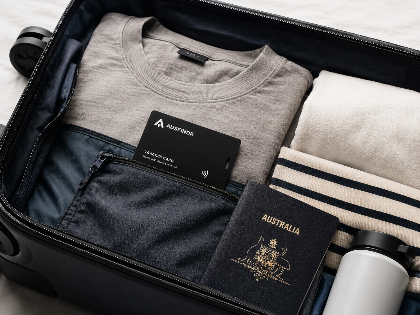 AusFindr Tracker Card in luggage