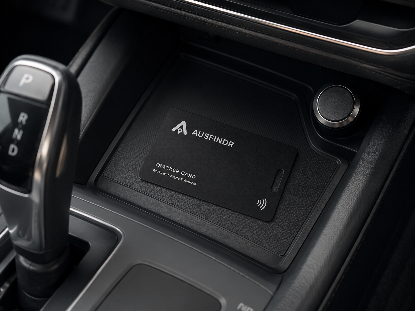 Ausfinder tracker card on a car dashboard